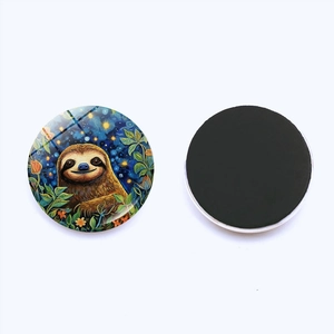 Detail of round crystal glass sloth magnet with magnetic backing for fridge decor