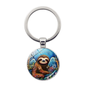 Cartoon sloth art glass cabochon keychain with vibrant floral illustration and silver ring