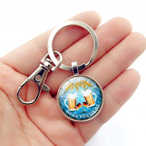 Portachiavi Oktoberfest Monaco con ciondolo in vetro, motivo birra e chiusura a moschettone