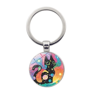 Portachiavi gatto spaziale con motivi di cielo stellato e pianeti colorati