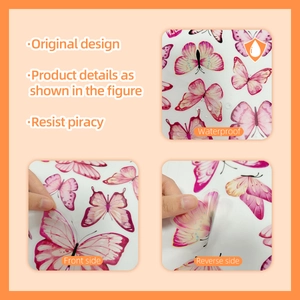 Detail view of pink butterfly wall stickers showing waterproof PVC material and adhesive