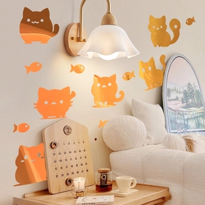 Cartoon cat and fish luminous wall stickers in glowing orange for kids room decor