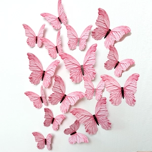 Set of 3D pink butterfly wall stickers with embossed texture and lifelike wing design