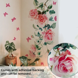 Detail of self-adhesive pink rose and butterfly wall stickers on a neutral bedroom wall