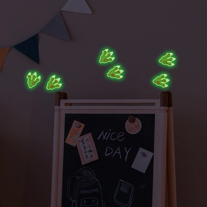 Luminous green dinosaur footprint wall stickers for children's room glowing in the dark