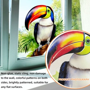Detail of static cling window sticker showing colorful watercolor toucan on clear glass