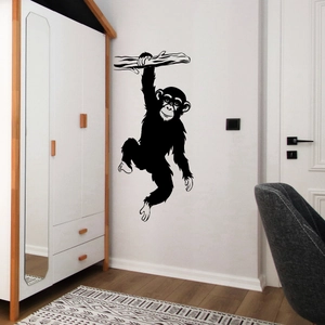 Creative black gorilla silhouette wall sticker on a white bedroom wall