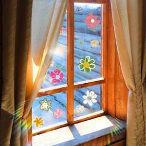 Rainbow prism flower window clings for glass with colorful daisy suncatcher effects