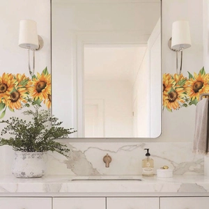 Vibrant sunflower wall stickers shown applied on bathroom mirrors for home decoration