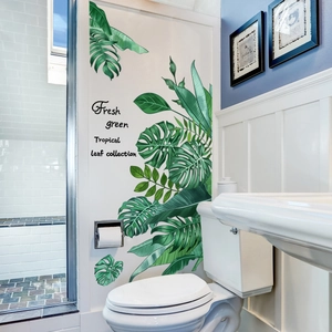 Tropical monstera and palm leaf wall decals for bathroom decor with fresh green plant motifs