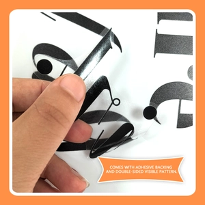 Detail of self-adhesive transparent wall sticker with double-sided visible pattern