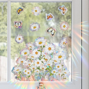 Regenboog vensterstickers met madeliefjes en vlinders voor een prisma-effect op glas