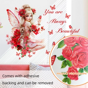 Dettaglio dell'adesivo murale fata con rose rosse e retro adesivo in primo piano