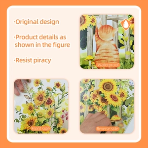 Waterproof wall sticker detail showing sunflower motifs, orange cat, and adhesive backing