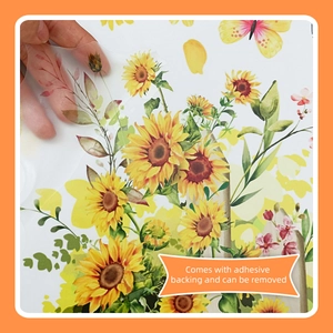 Close-up of self-adhesive sunflower wall sticker being peeled with removable backing