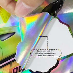 Close-up of laser holographic sticker showing iridescent color shifts and adhesive backing