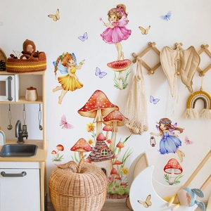 Detailed view of watercolor fairy and mushroom house wall stickers in a nursery room