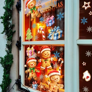 Festive Christmas window decals featuring gingerbread man, snowflakes and Merry Christmas text
