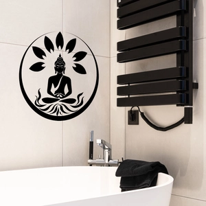 Detail of a black Zen Buddha lotus wall decal on marble tiles in a modern bathroom