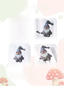 Garden gnome iron stakes shown in individual OPP bags with decorative back cards