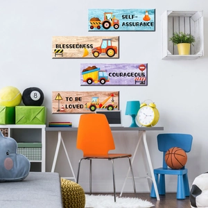Detail showing four construction vehicle wall art panels in a cozy kid's study room