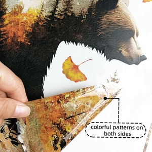 Detail of double-sided autumn bear sticker with colorful patterns and matte texture