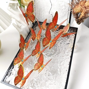 3D butterfly wall stickers in orange and gold with blue gems for home decoration
