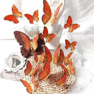 3D butterfly wall stickers with golden outlines and blue gems on orange PVC wings
