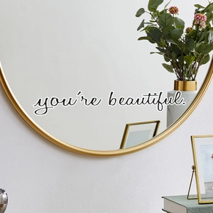 Luminous 'You're Beautiful' inspirational wall sticker on a round gold mirror decor