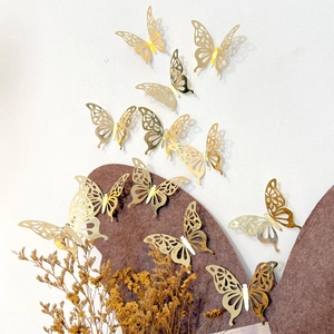 12pcs 3D hollow gold butterfly wall stickers with mirrored metallic finish for home decor