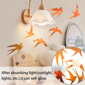 Luminous orange swallow wall stickers with glow-in-the-dark effect for home decoration