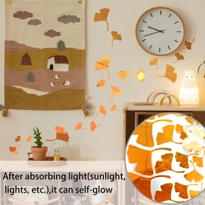 Macro detail of orange luminous ginkgo leaf wall stickers with self-adhesive PVC texture