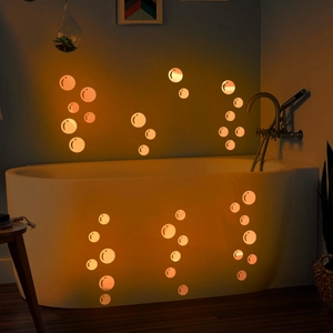 Macro detail of glowing orange bubble wall stickers for bathroom and kids room decor