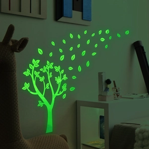 Sticker mural lumineux avec arbre minimaliste et feuilles en vert fluorescent