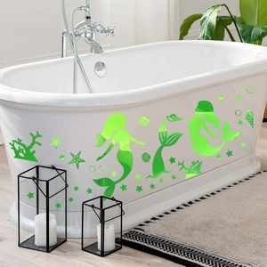 Stickers muraux sirène vert lumineux sur baignoire blanche décorative de salle de bain