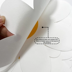Detail of white daisy wall sticker showing eco-friendly non-PVC material and hidden adhesive