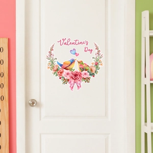 Detail of Valentine's Day wall stickers featuring birds and roses on a white door