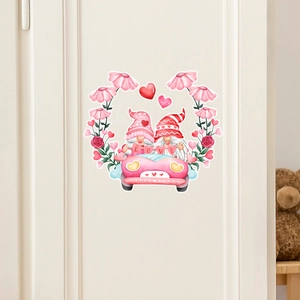 Detailed view of Valentine gnome decals with LOVE hearts and pink floral wreath on white door