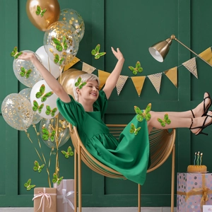 Detailed view of green 3D butterfly wall stickers with gold edges for home decoration