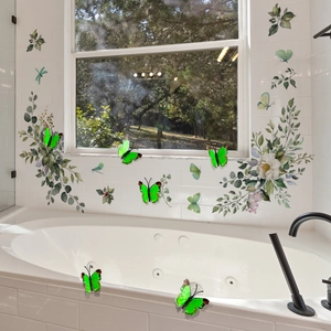 Green floral wall decals with 12 pieces of 3D glowing butterflies in a bathroom setting