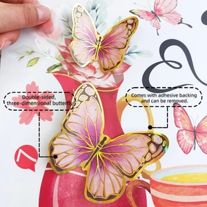 Detail of 3D pink butterfly wall sticker with gold edges and double-sided design
