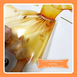 Detail showing the transparent adhesive backing of the dancing girl wall sticker