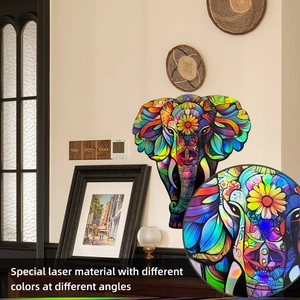 Detail of holographic elephant wall decal showing laser gradient color shifts with light