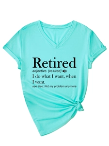Detail of turquoise V-neck T-shirt showing the knotted hem and creative Retired text print