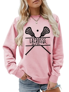 Detail of pink long sleeve Lacrosse Mom sweatshirt with cross sticks graphic and lettering