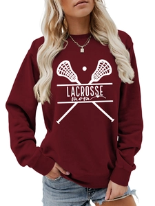 Detail of burgundy Lacrosse Mom sweatshirt with cross sticks graphic and ribbed cuffs