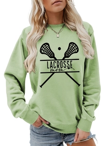 Close-up of mint green Lacrosse Mom sweatshirt with ribbed cuffs and graphic print