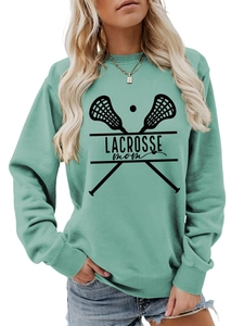 Detail showing the Lacrosse Mom print on mint green long sleeve sweatshirt fabric