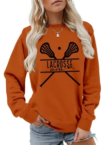Detail of orange crewneck sweatshirt showing the Lacrosse Mom print and ribbed cuffs