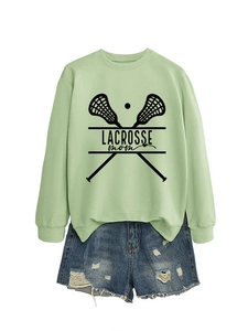 Sage green lacrosse mom crewneck sweatshirt with soft cotton fabric and black graphic print